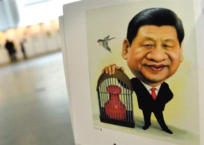 圖為習(xí)近平的肖像漫畫。