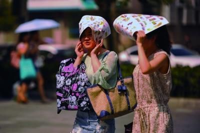 進(jìn)入7月份以來，南京出現(xiàn)了多個高溫天氣。本報(bào)資料圖片 劉瀏 攝
