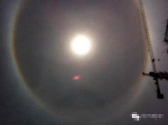 上?，F(xiàn)UFO 專家稱光圈是日暈亮點或是飛行器(圖)