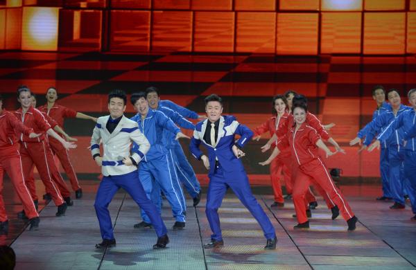 《小蘋果》、《最炫民族風(fēng)》等廣場舞曲將會有全國統(tǒng)一、編排科學(xué)、帶給人正能量的全新動(dòng)作。 CFP 資料